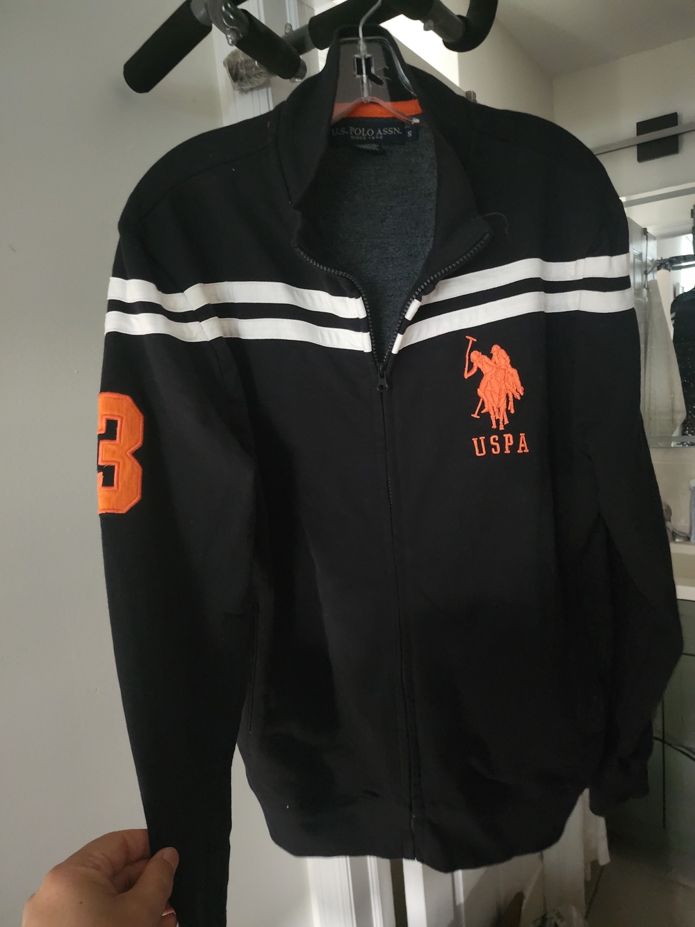 U.S. Polo Assn. Black Jacket with Orange Logo & White Stripes